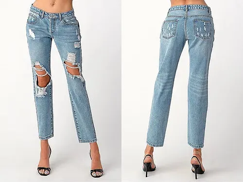 Distressed light wash denim jeans