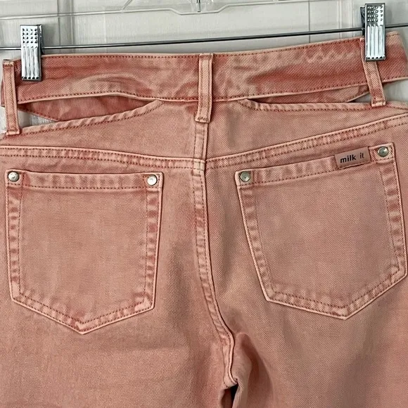 Free People MILK IT Pink Flare Jeans Cutout Waist Size 24 Boho Streetwear Cotton
