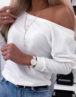 Long-sleeved Harper button-down top with open back