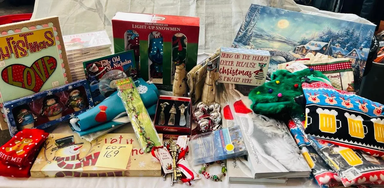 Lot 169- Large Lot Christmas New, 4 Christmas ugly sweaters, Artwork, Banners, outside 7 foot banners, 2 sets of Christmas Kitten cards, 17 Christmas CD sets, snowmen, solar stake, believe bells etc, 56 Pieces